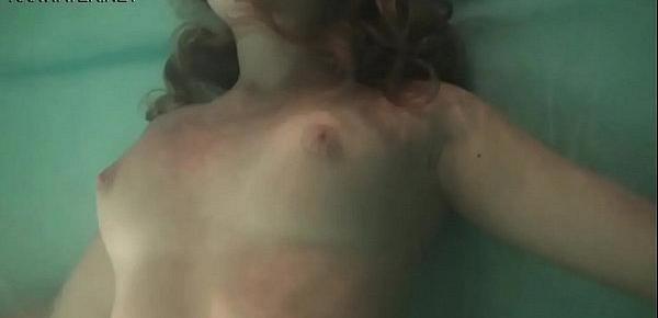  Slightly hairy teen Olga Kukuruzina masturbates in the pool